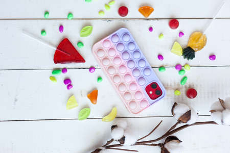 Phone case  on white wooden backgroundの写真素材