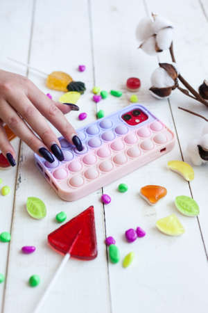 Phone case  on white wooden backgroundの写真素材