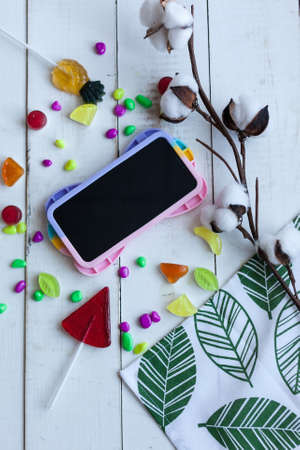 Phone case with pop it on white wooden backgroundの写真素材