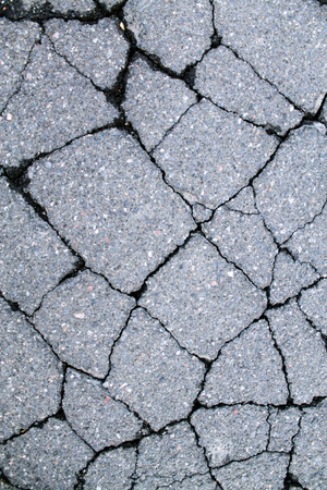 Old cracked asphaltの写真素材