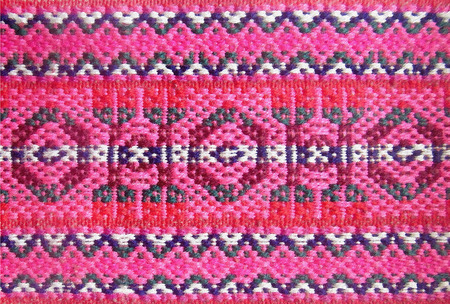 Tribal, ethnic knitted pattern. National background with geometric elements. Authentic ornaments.の写真素材