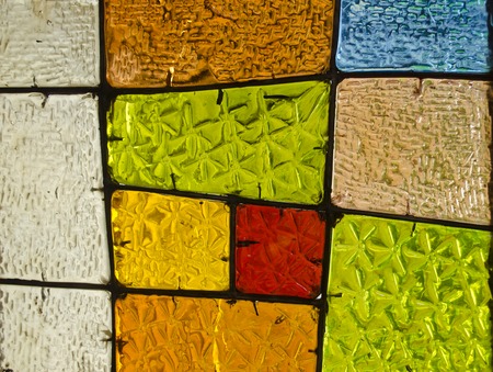 Abstract geometric colorful background. Image of a multicolored stained glass church window with...