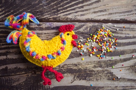 New year 2017 symbol - handmade rooster on a wooden backgroundの写真素材