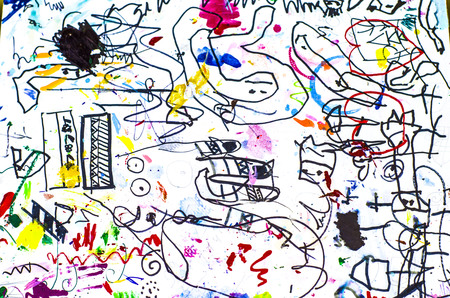 Black doodle on white paper with elements of red , blue and yellow color. Pattern for textiles, wrapping paper, wallpaper.の写真素材