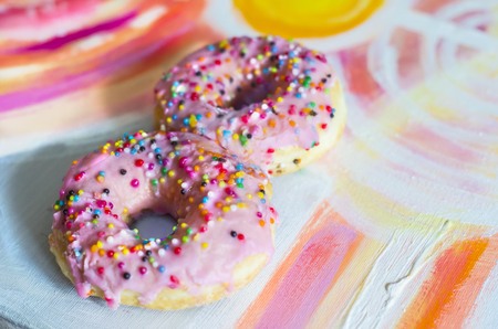 Pink Donuts in the form of 8 in a picturesque background. The International Women's Day.の写真素材