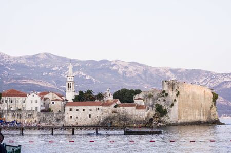 Budva bay. The view at the medieval citadel. Panoramic view. Medieval cities in the Mediterranean. Resort of Adriatic Riviera.の写真素材