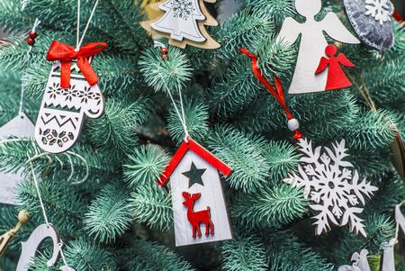 Merry Christmas and Happy New Year festive card. Christmas fir tree decoration. Holiday composition. Festive background.の写真素材