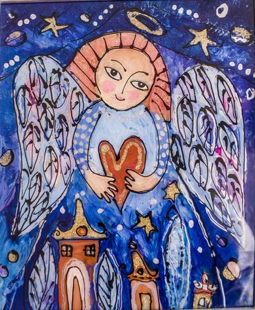 Angel with heart in hands on night landscape background. Fairytale winter Christmas illustration. Painting on glass.の写真素材
