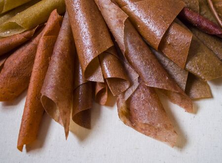 Sweet pure fruit pastille. Natural sweets from dried berries and fruits. Useful sweetness is...