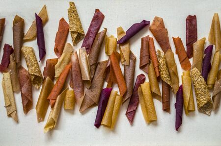 Sweet pure fruit pastille. Natural sweets from dried berries and fruits. Useful sweetness is pastille, fruit chips. Dietary vitamin nutrition. Vegan Food. hand-made sweets, sweetness, dessert.の写真素材
