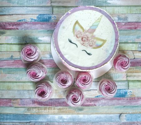 Piece of caramel cake with cream. Group of homemade marshmallow zephyr on colorful background ,の写真素材
