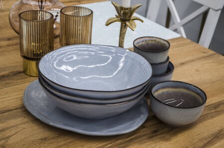Still life with plates and cups in the style of Hughes. Interior photo.の写真素材