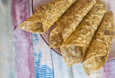Sweet pure fruit pastille. Natural sweets from dried berries and fruits. Useful sweetness is pastille, fruit chips. Dietary vitamin nutrition. Vegan Food. hand-made sweets, sweetness, dessert.の写真素材