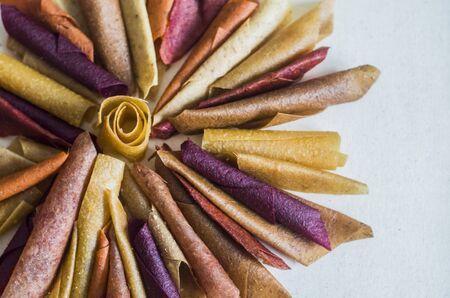 Sweet pure fruit pastille. Natural sweets from dried berries and fruits. Useful sweetness is pastille, fruit chips. Dietary vitamin nutrition. Vegan Food. hand-made sweets, sweetness, dessert.の写真素材