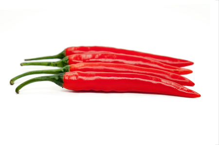 Fresh juicy peppers isolated on a white background.の写真素材