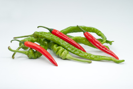 Fresh juicy peppers isolated on a white background.の写真素材