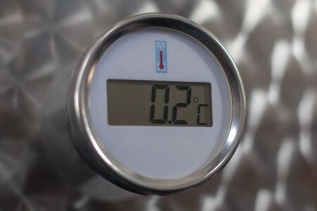 Circle thermometer measure on metalの写真素材