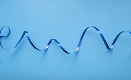 party ribbon confetti on blueの写真素材