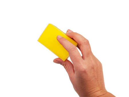 Sponge for washing dishes in hand isolated on the white