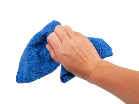 Blue cleaning rag in hand isolated on the white