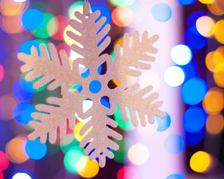 Christmas toy on garland lights abstractionの写真素材