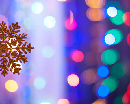 Christmas toy on garland lights abstractionの写真素材