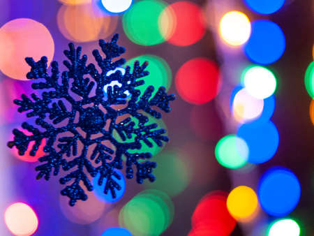 Christmas toy on garland lights abstractionの写真素材