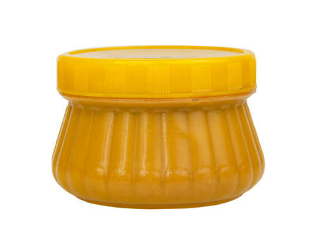 Yellow box pack for mustard isolated on the white backgroundの写真素材