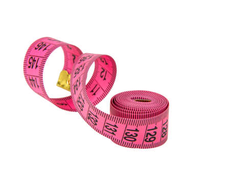 Pink tape measure roll isolated on the white backgroundの写真素材
