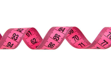 Pink tape measure roll isolated on the white backgroundの写真素材