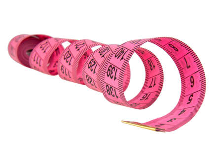 Pink tape measure roll isolated on the white backgroundの写真素材