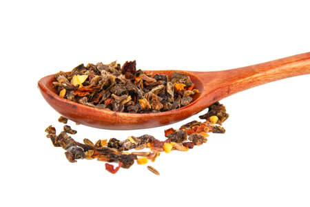 Aroma dried different spices in wooden spoon isolated on the white backgroundの写真素材