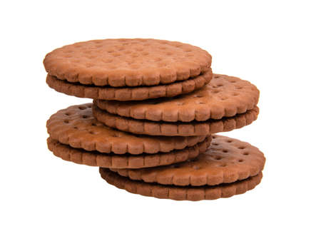Brown sandwich cookies isolated on the white background