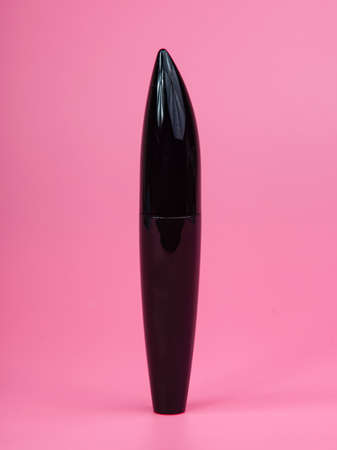Black tube mascara for lashes make up on pink backgroundの写真素材