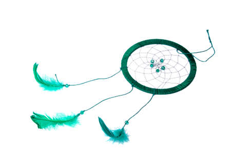 magic green dream catcher with feathers isolated on the whiteの写真素材
