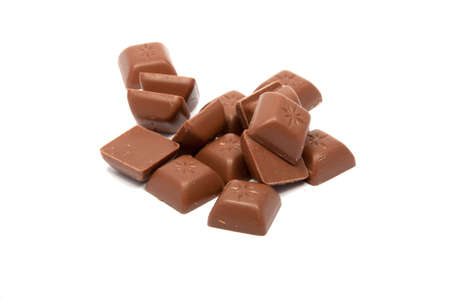 Tasty chocolate in squares on the white