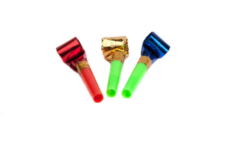 Party foil whistle on the white background