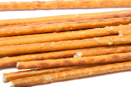 Salty sticks bread snack isolated on the whiteの写真素材