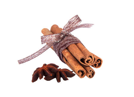 Cinnamon sticks with ribbon isolated on the white
