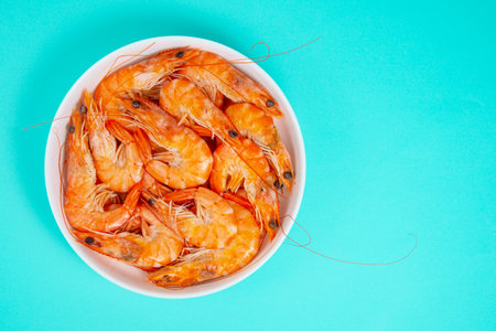 Sea shrimp fresh on blue backgroundの写真素材