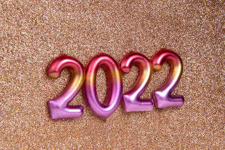 Multicolor creative 2022 numbers on decorative background with copy spaceの写真素材