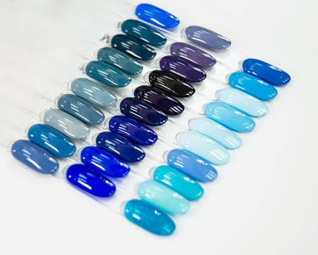 Multicolor different palette gel varnishes examples for manicure on the white background