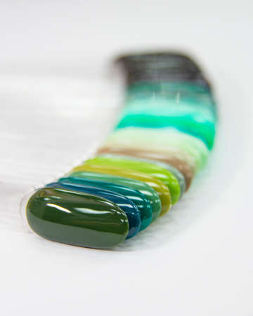 Multicolor different palette gel varnishes examples for manicure on the white backgroundの写真素材