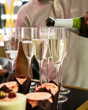 On table champagne glass party background. Selective focus and no trademark.の写真素材