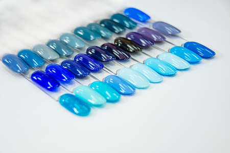 Multicolor different palette gel varnishes examples for manicure on the white backgroundの写真素材