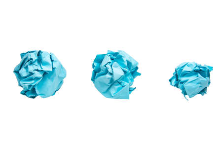 Crumpled balls blue paper isolated on the white backgroundの写真素材