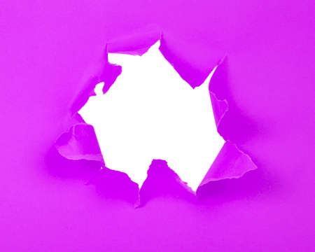 Violet crushed torn paper with hole copyspace background for ideaの写真素材