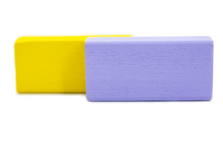 Wooden multicolor construction cubes bricks isolated on the white backgroundの写真素材