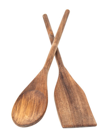 Wooden spoons, spatulas and a rolling pin isolated on white backgroundの写真素材