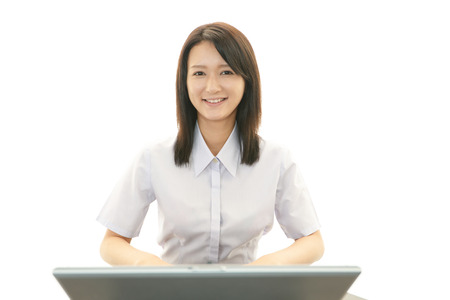Business woman working on laptopの写真素材